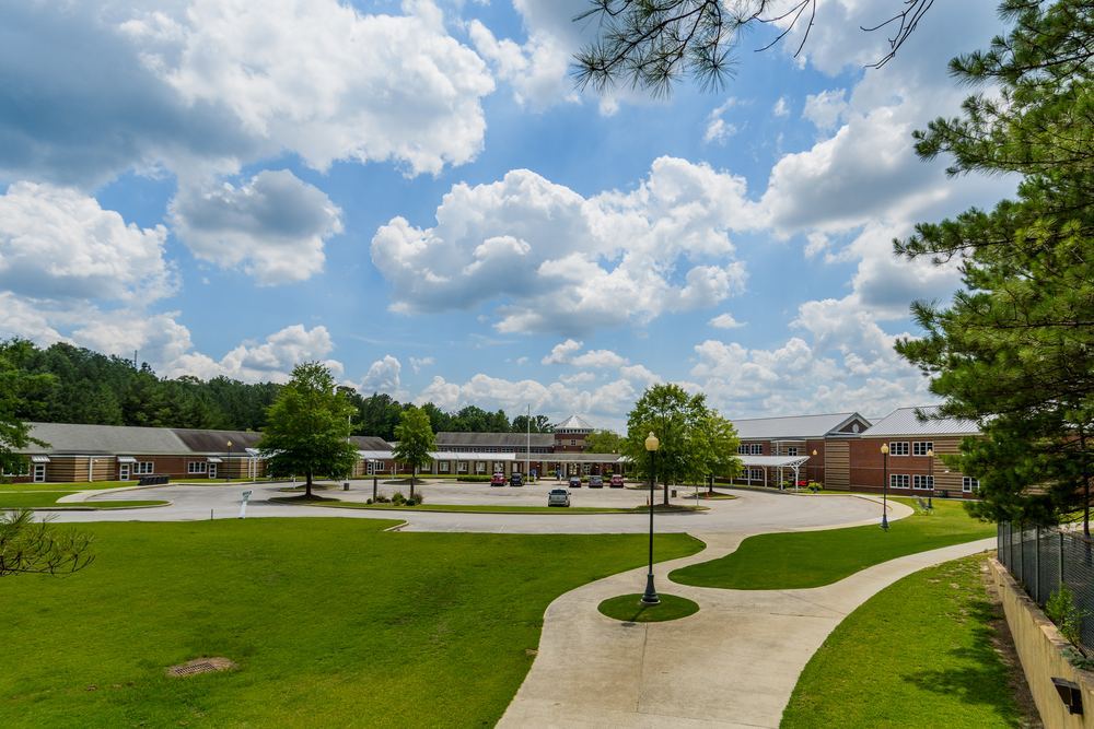 School building and walkway inside Liberty Park